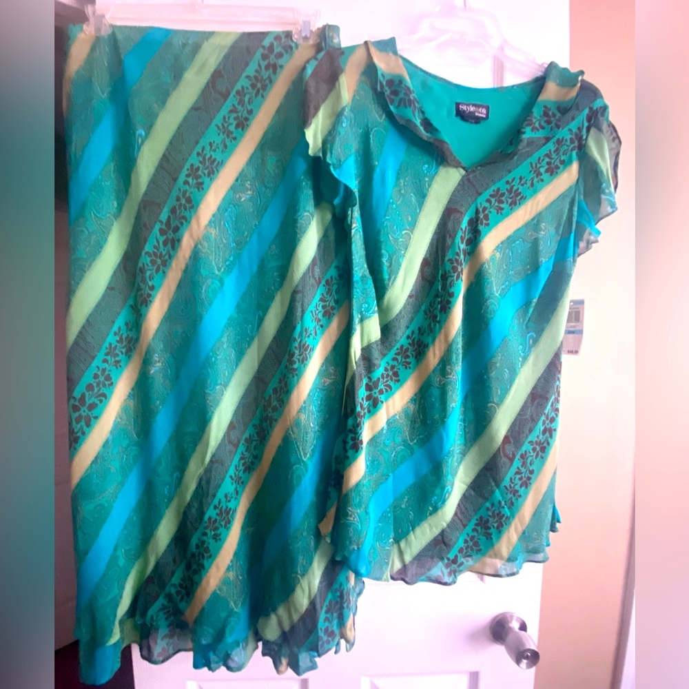 Beautiful rayon lined skirt with matching blouse.